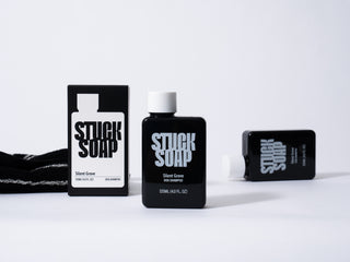 Silent Grove 120 ml carton, an upright bottle and a second bottle lying down, with a black knit scarf