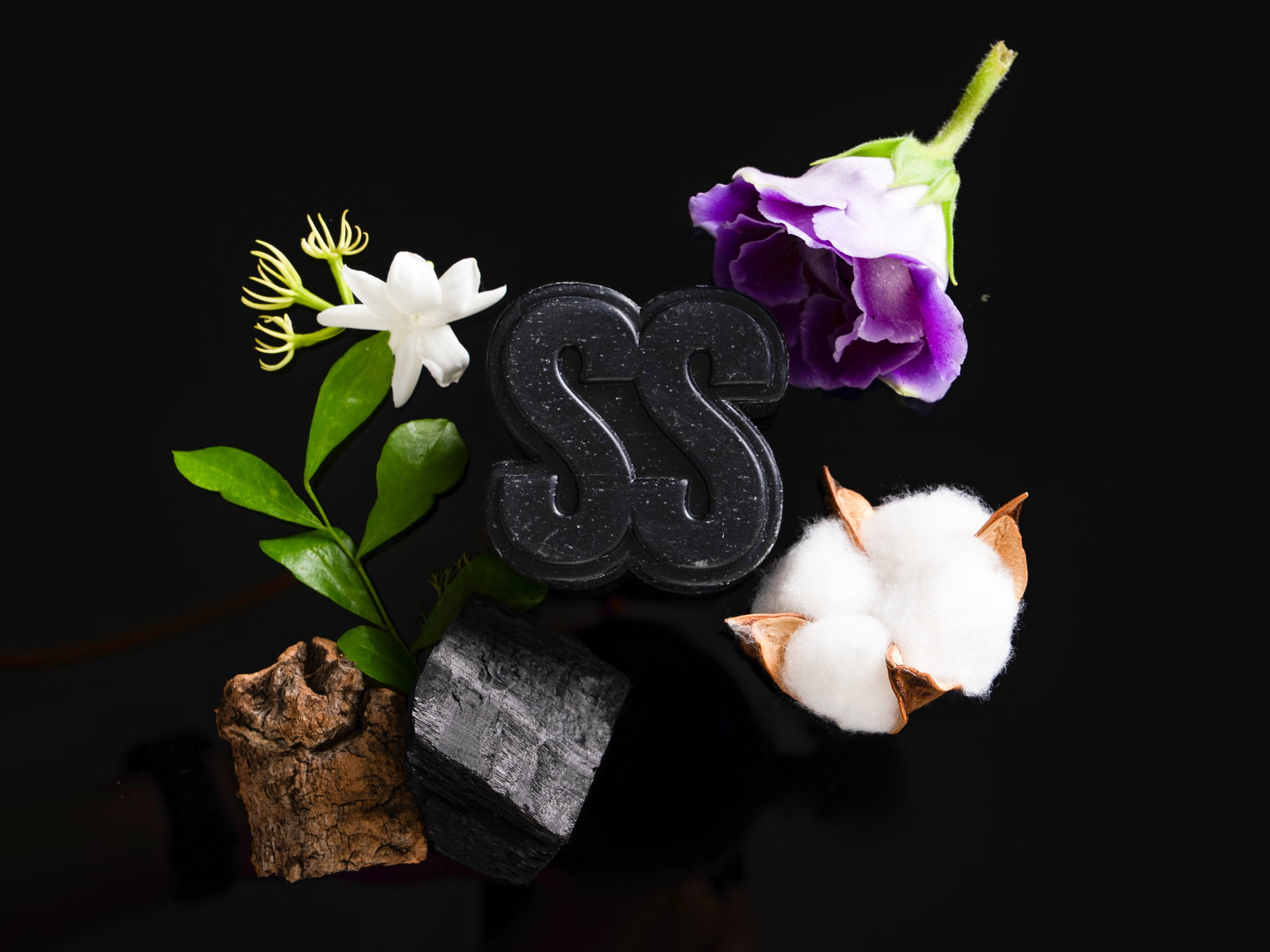 Silent Grove charcoal soap bar with cotton, wood and charcoal